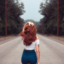 woman standing on road
