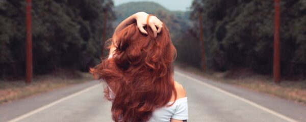 woman standing on road